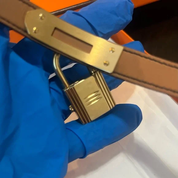 Hermes Kelly Black Leather Watch with Gold Accents